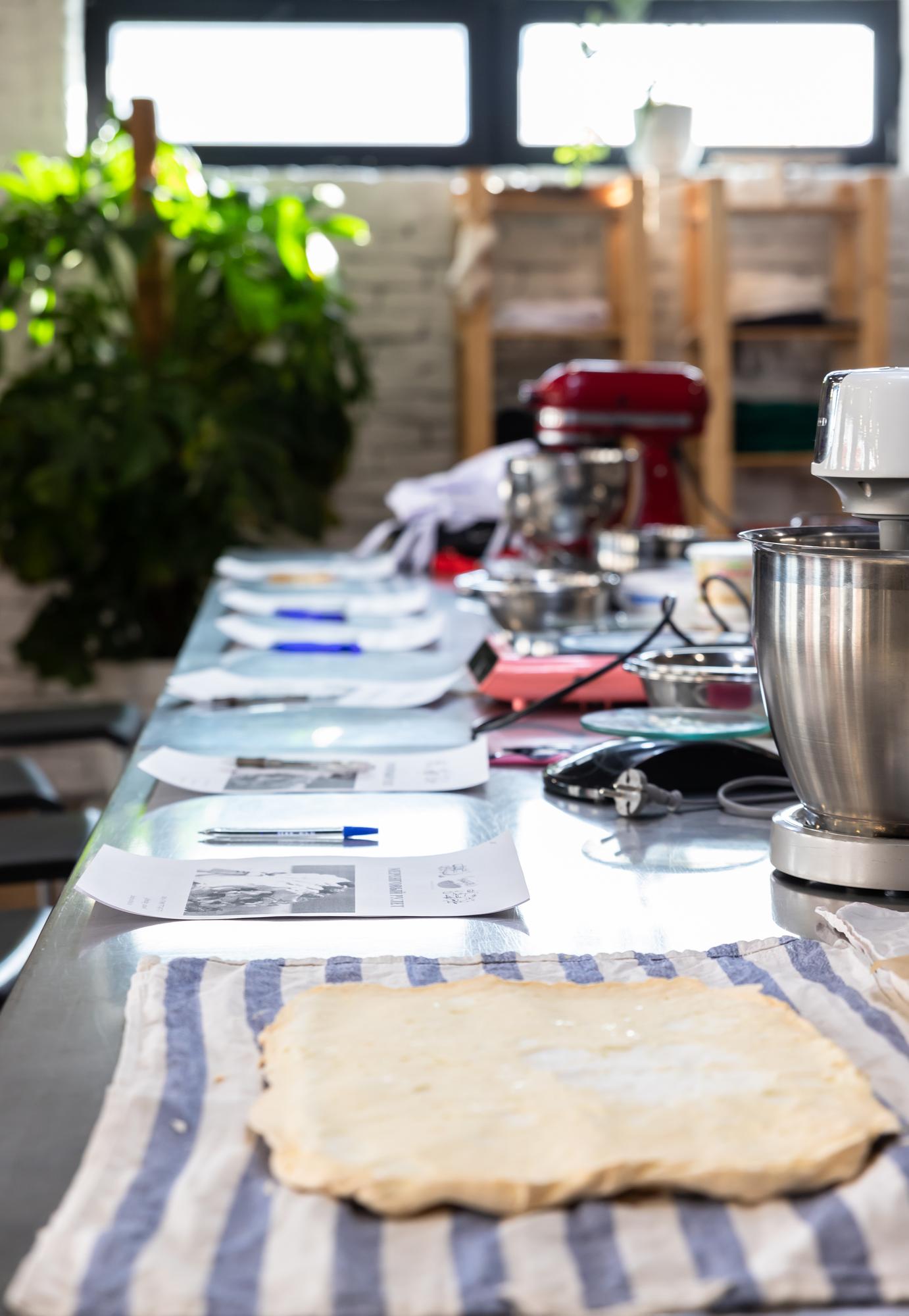 Workshop table with cooking tools and ingredients